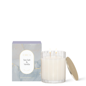 CIRCA Sea Salt and Vanilla 350g Soy Candle burning beside box